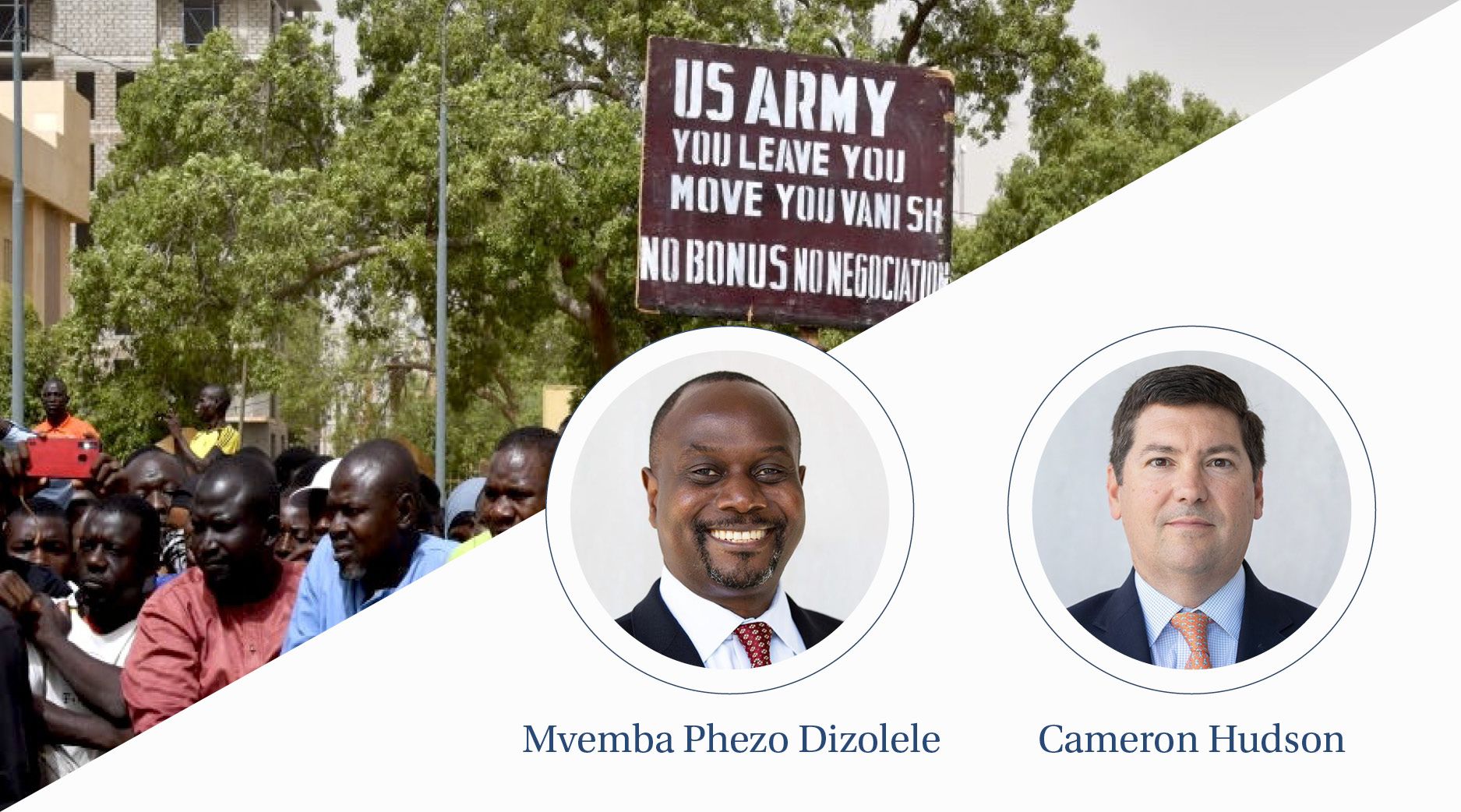 Protesters gather and look unhappy as a man holds up a sign demanding that soldiers from the United States Army leave Niger without negotiation.