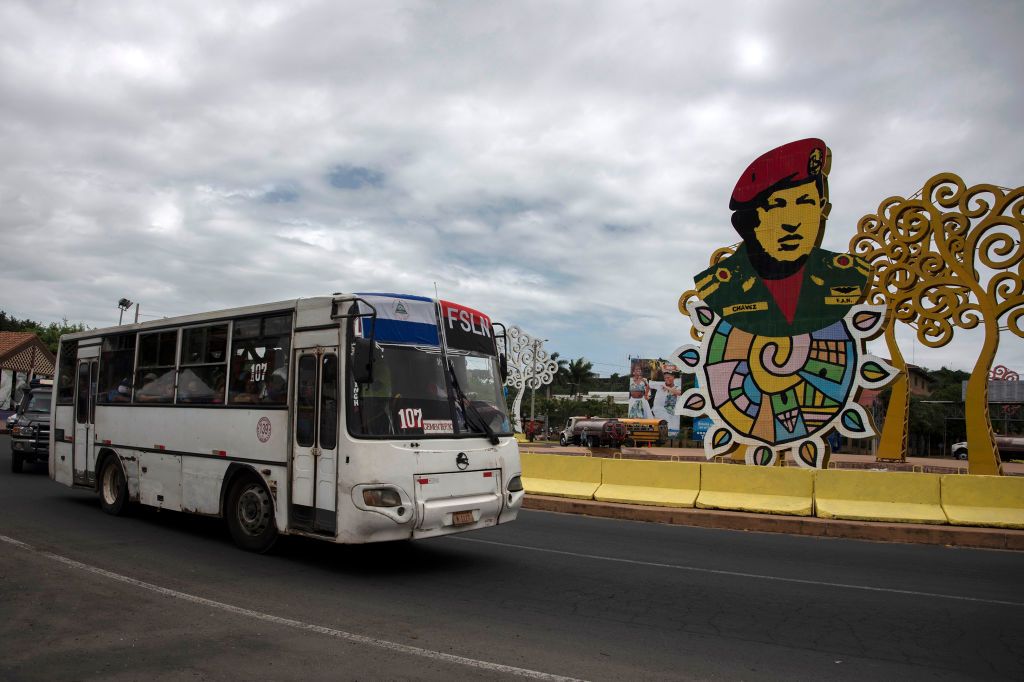 A public transport bus rides along the Hugo Chavez Avenue in Managua, Nicaragua in 2020. | Maynor Valenzuela/AFP via Getty Images