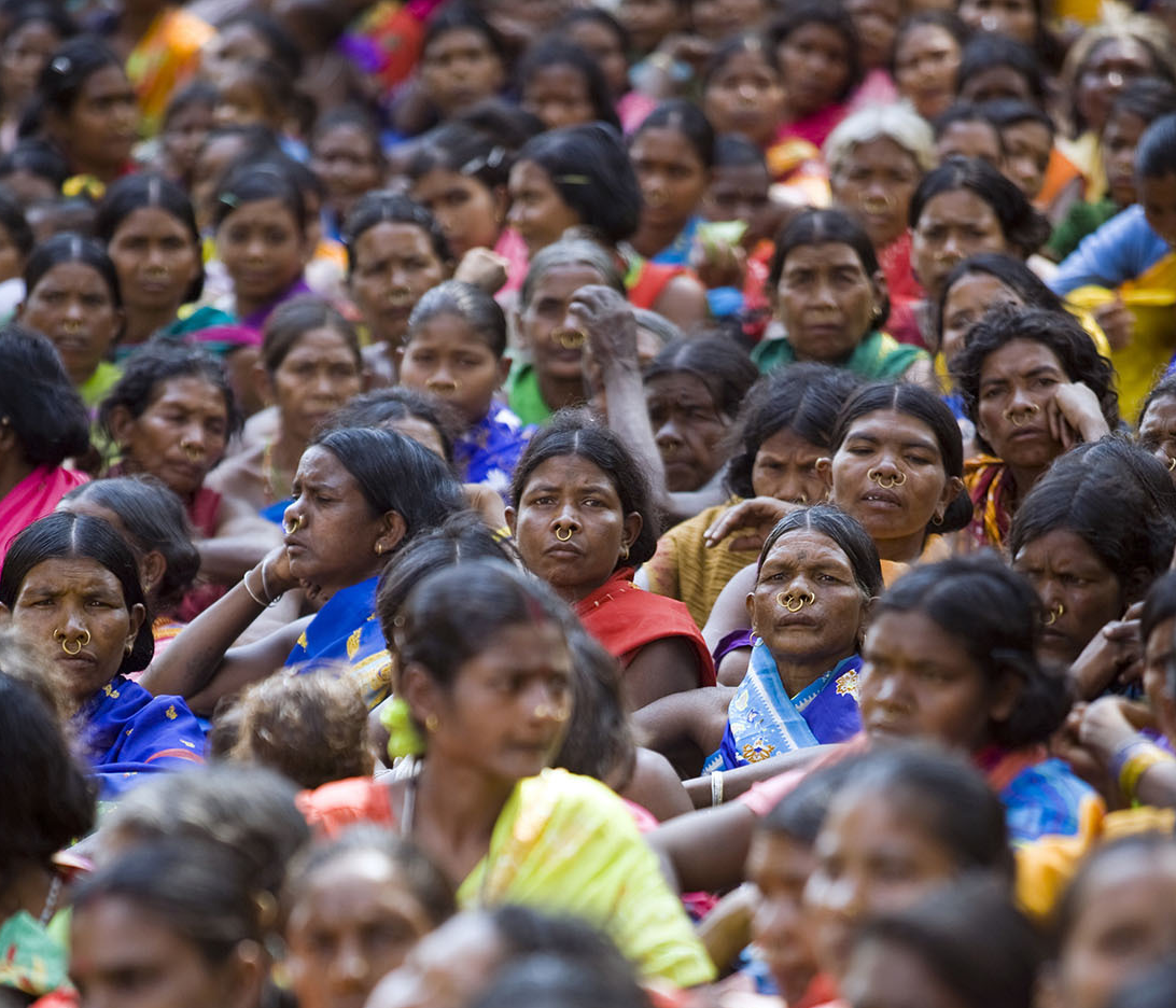 A crowd listens to speeches at a rally organized by the Adim Adhikar Surakshya Manch, a group to protect tribal groups in Bijepur, India. | In Pictures Ltd./Corbis via Getty Images