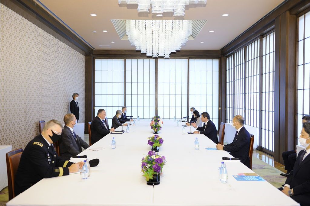 Delegates from Japan and the United States meet in Tokyo in October 2020, prior to Japan-U.S.-Australia-India Foreign Ministers Meeting to affirm their commitment to a free and open Indo-Pacific region. | David Mareuil/Anadolu Agency via Getty Images