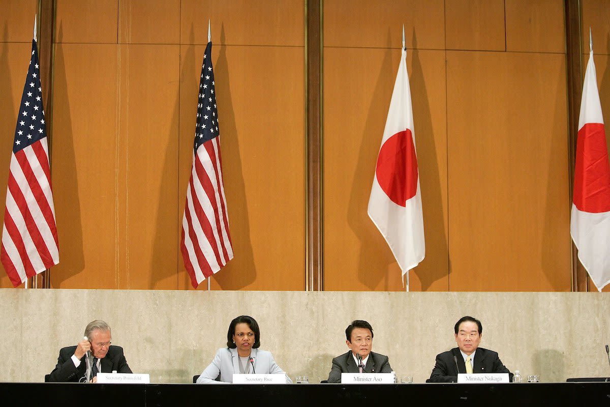 Delegates from the United States and Japan attend a post-meeting statement on May 1, 2006 following the finalization of the realignment plan of U.S. forces in Japan. | Alex Wong/Getty Images