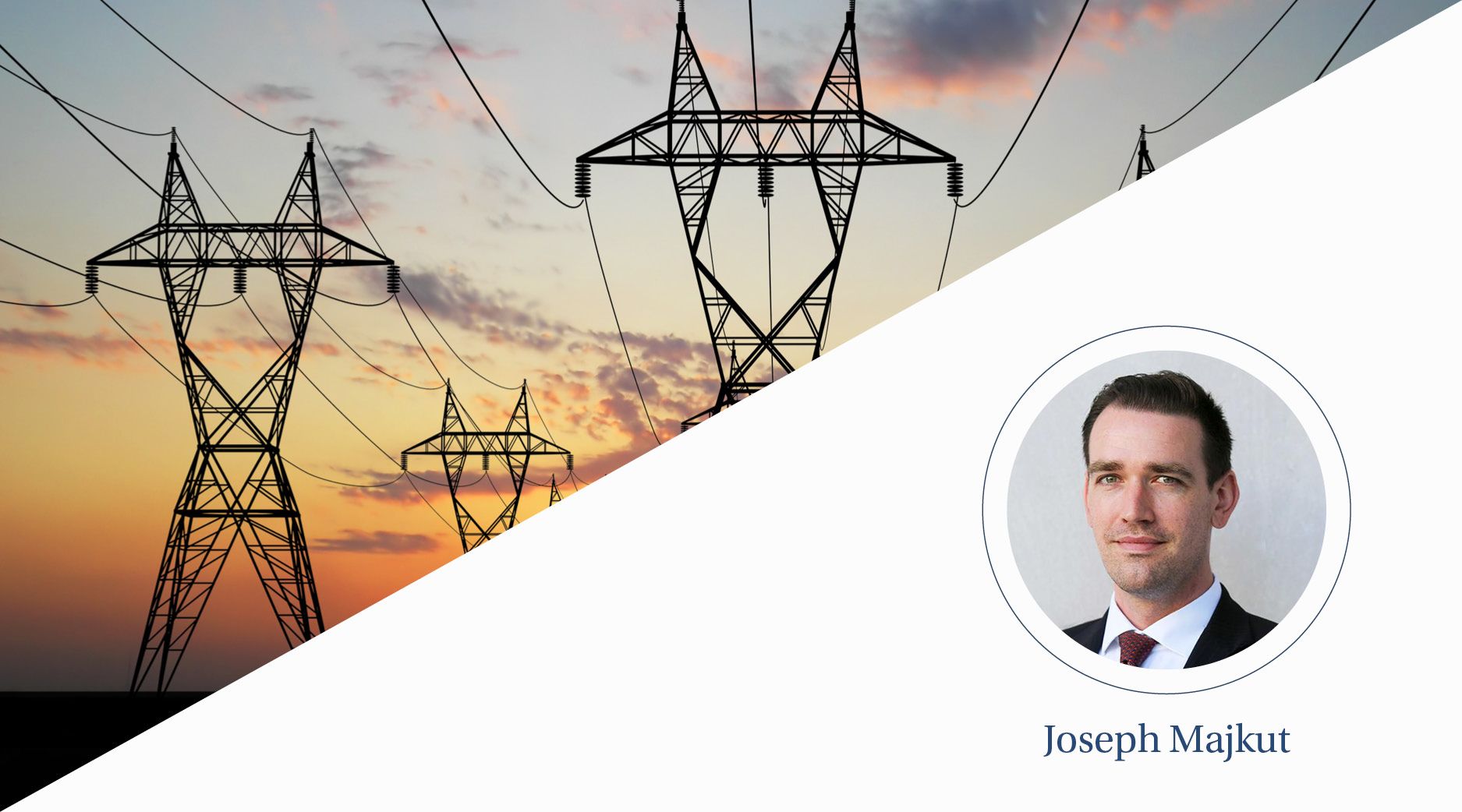 A view of telephone wires and towers at sunset.