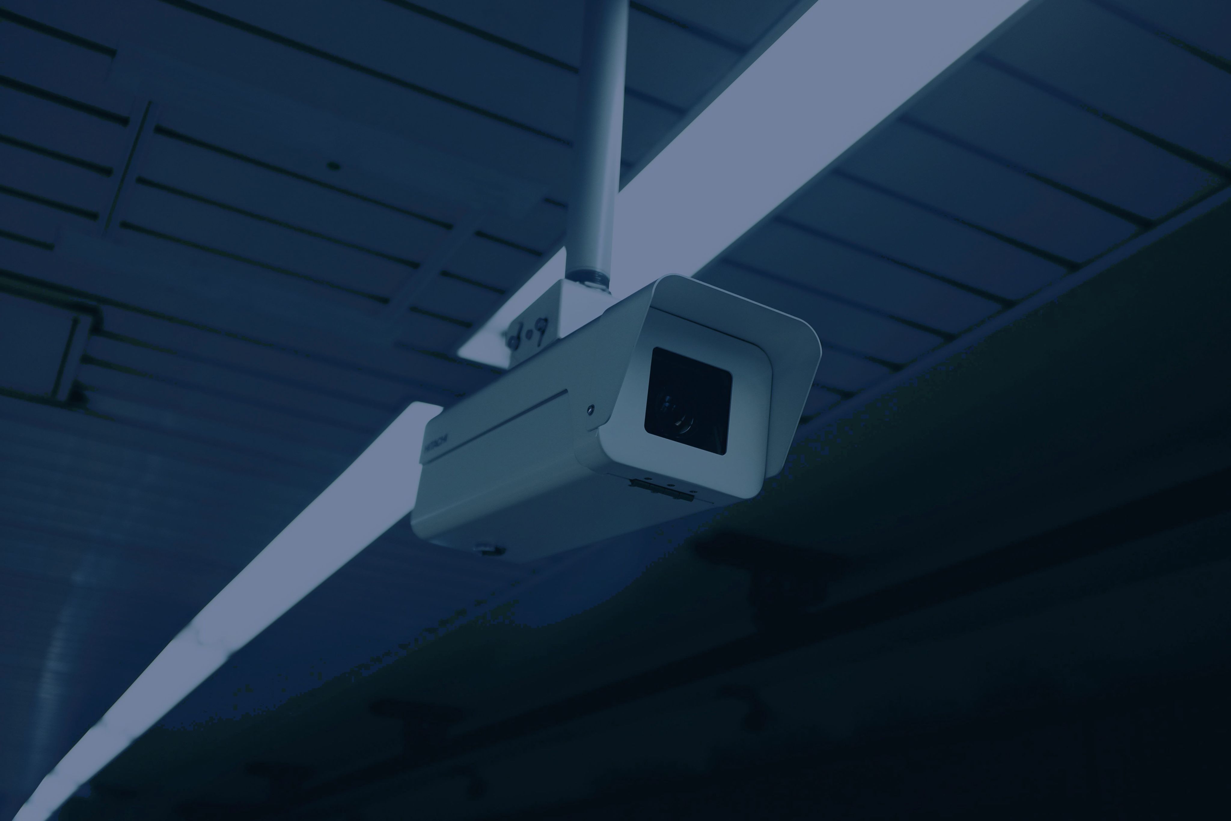 white security camera | Photo by Alex Knight on Unsplash