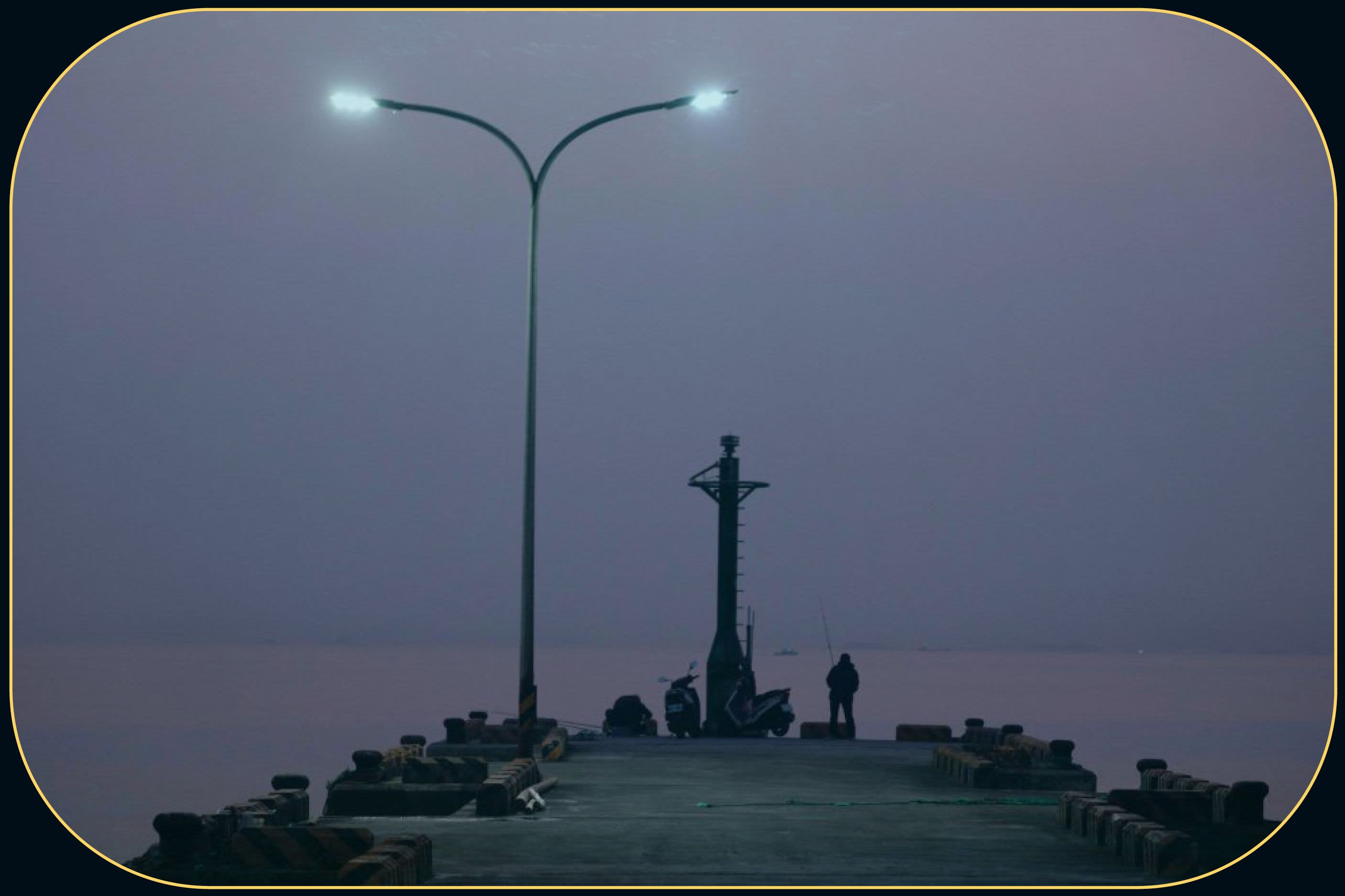The end of a dock at dusk.