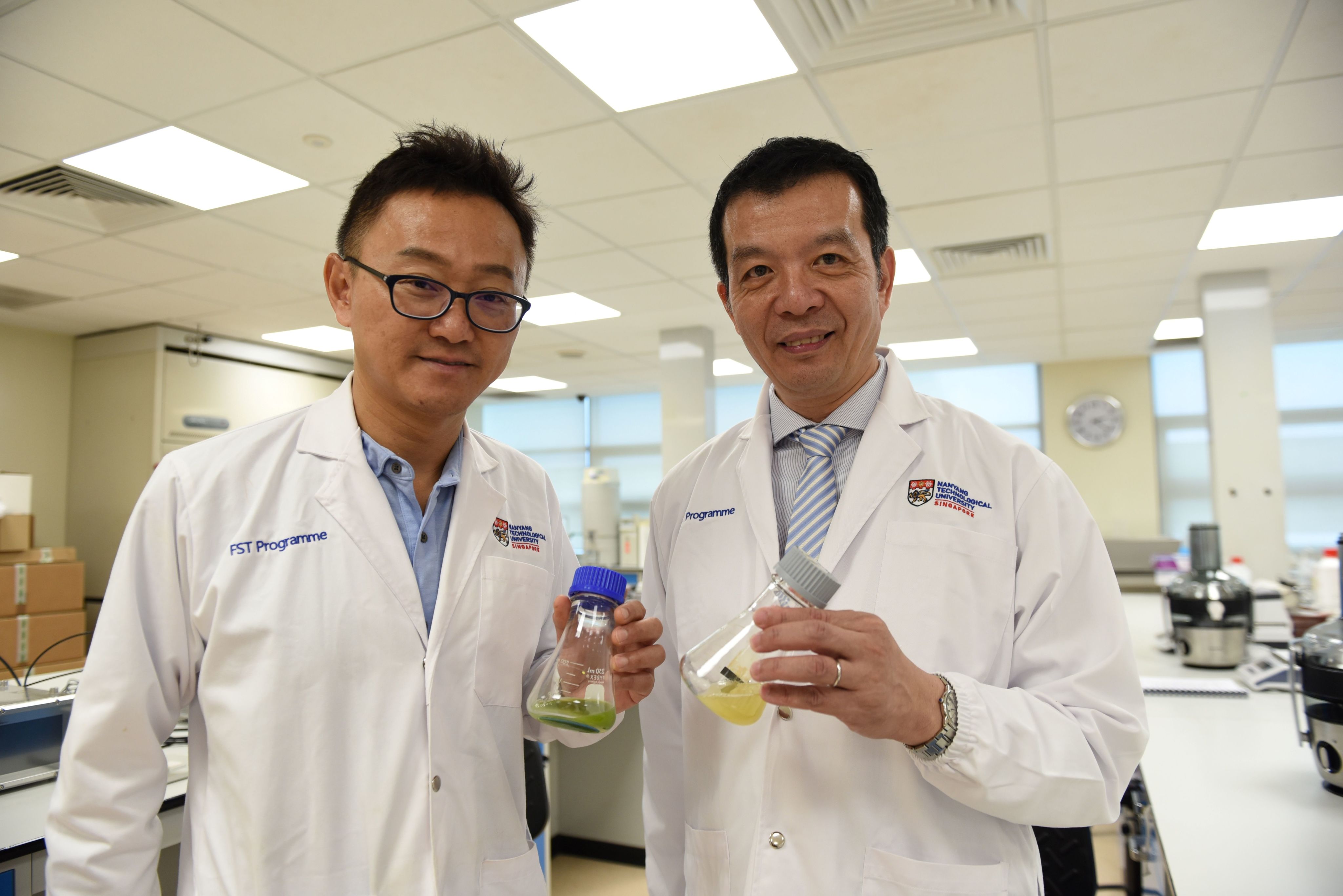 At Singapore's Nanyang Technological University, the director of the Food Science and Technology Program poses with the founder of an alt-protein company