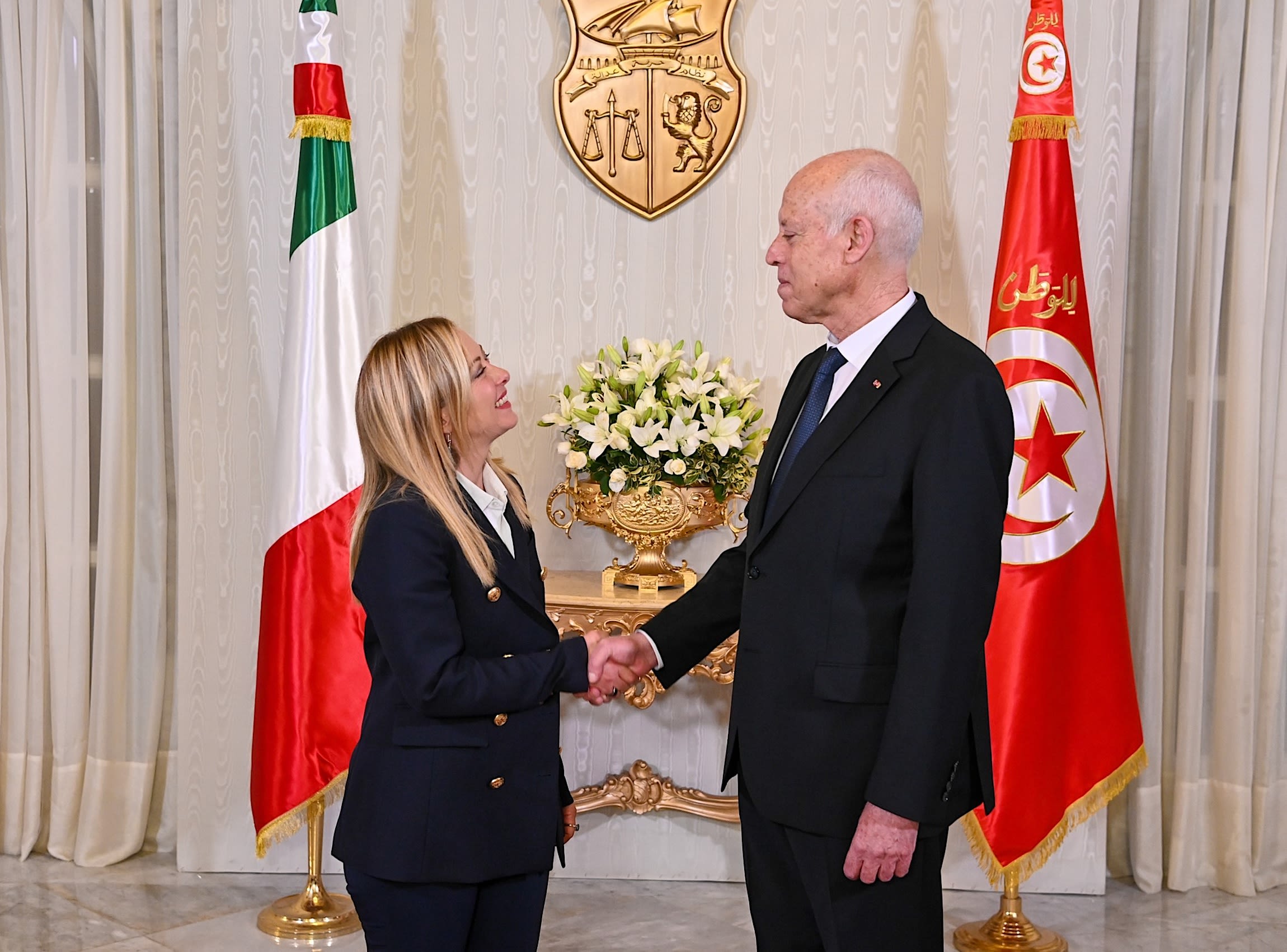 Italian Prime Minister Giorgia Meloni (L) meets with the Tunisian President Kais Saied (R) during her visit in Tunis, Tunisia, on June 06, 2023. | Photo by Tunisian Presidency / Handout / Anadolu Agency via Getty Images