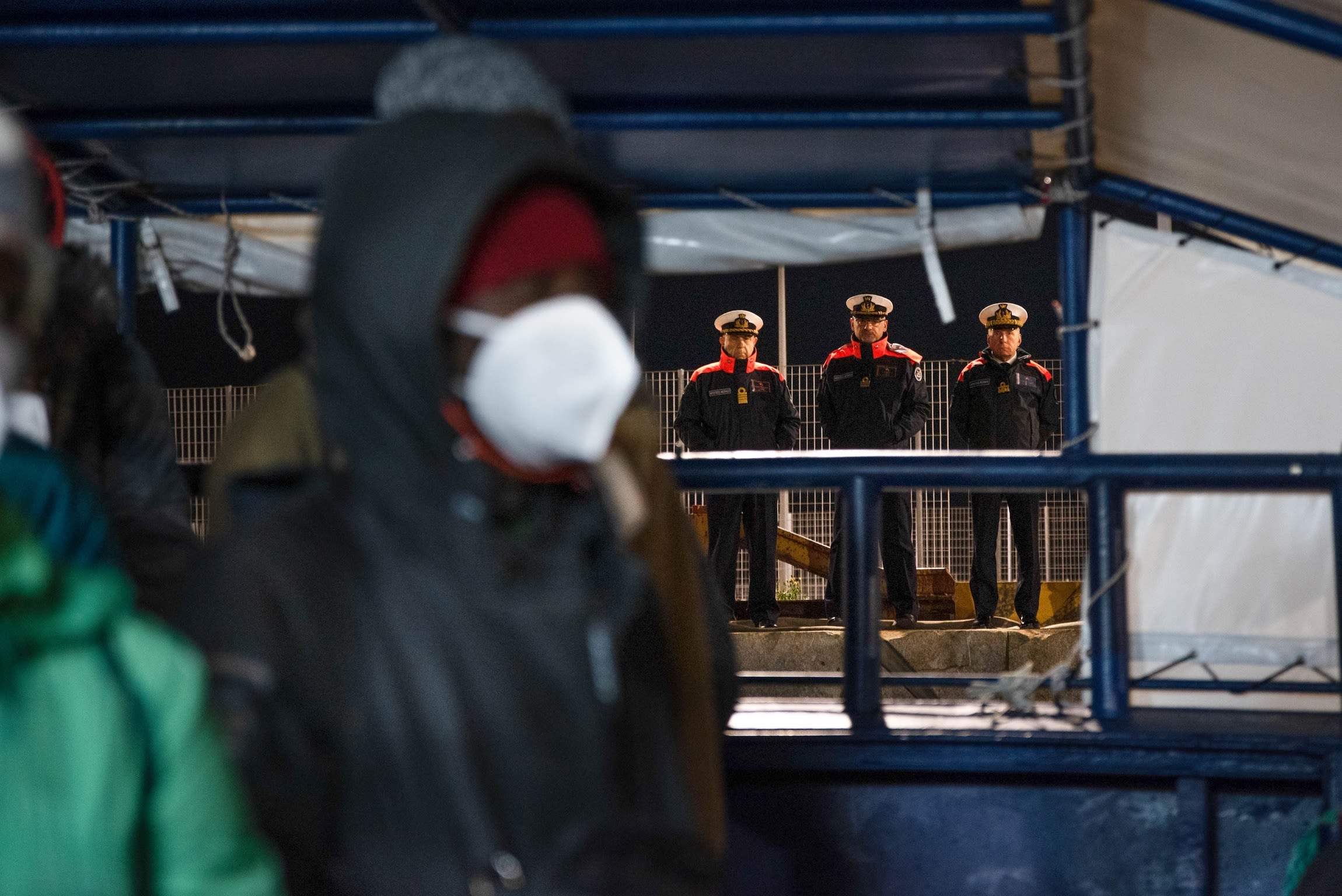 Italian police surround the rescue ship Aita Mari to guard the landing of African migrants at the port of Cittavecchia, Italy, in 2023. | Ximena Borrazas / SOPA Images / LightRocket via Getty Images