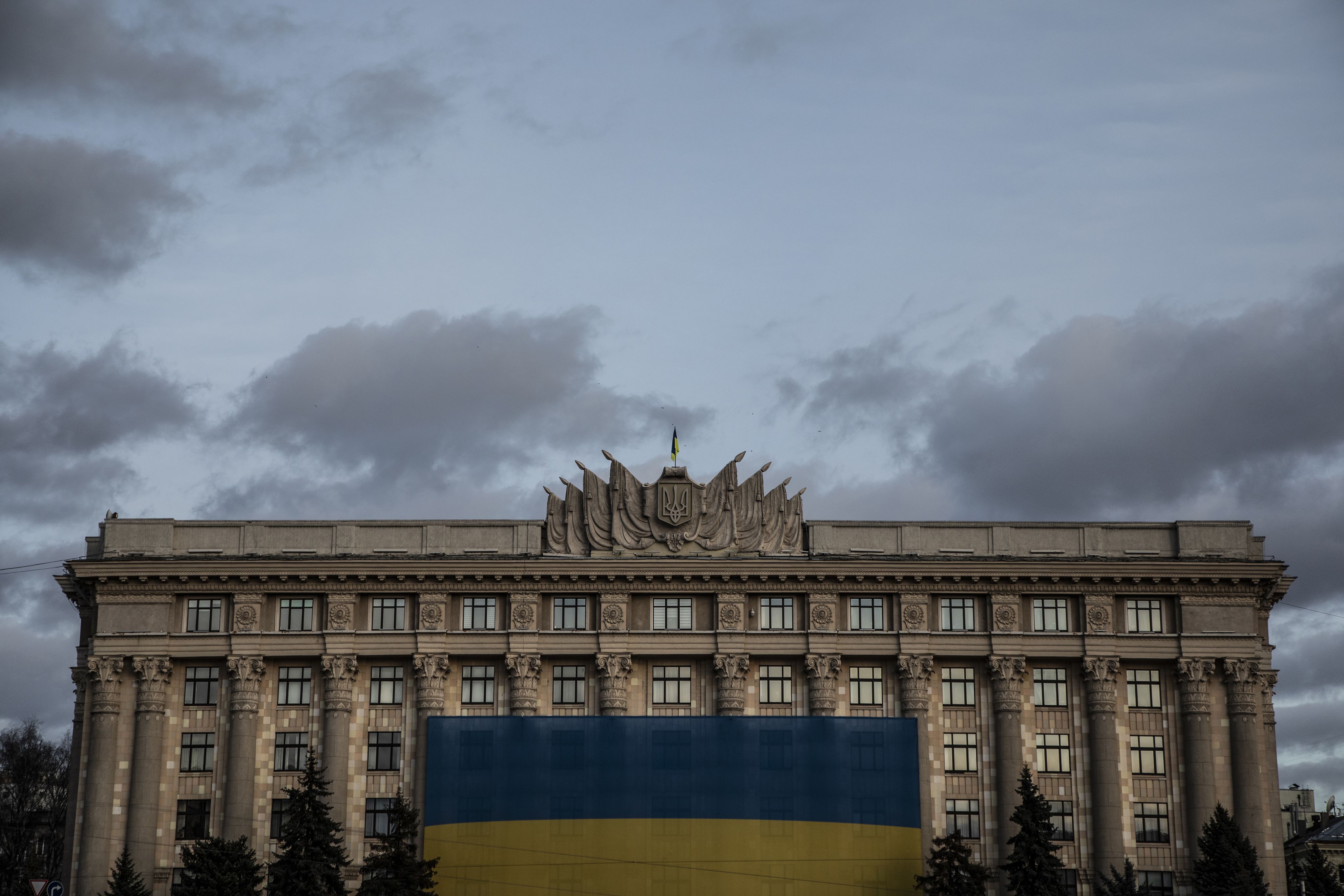 header image of ukraine flag, grain, and port