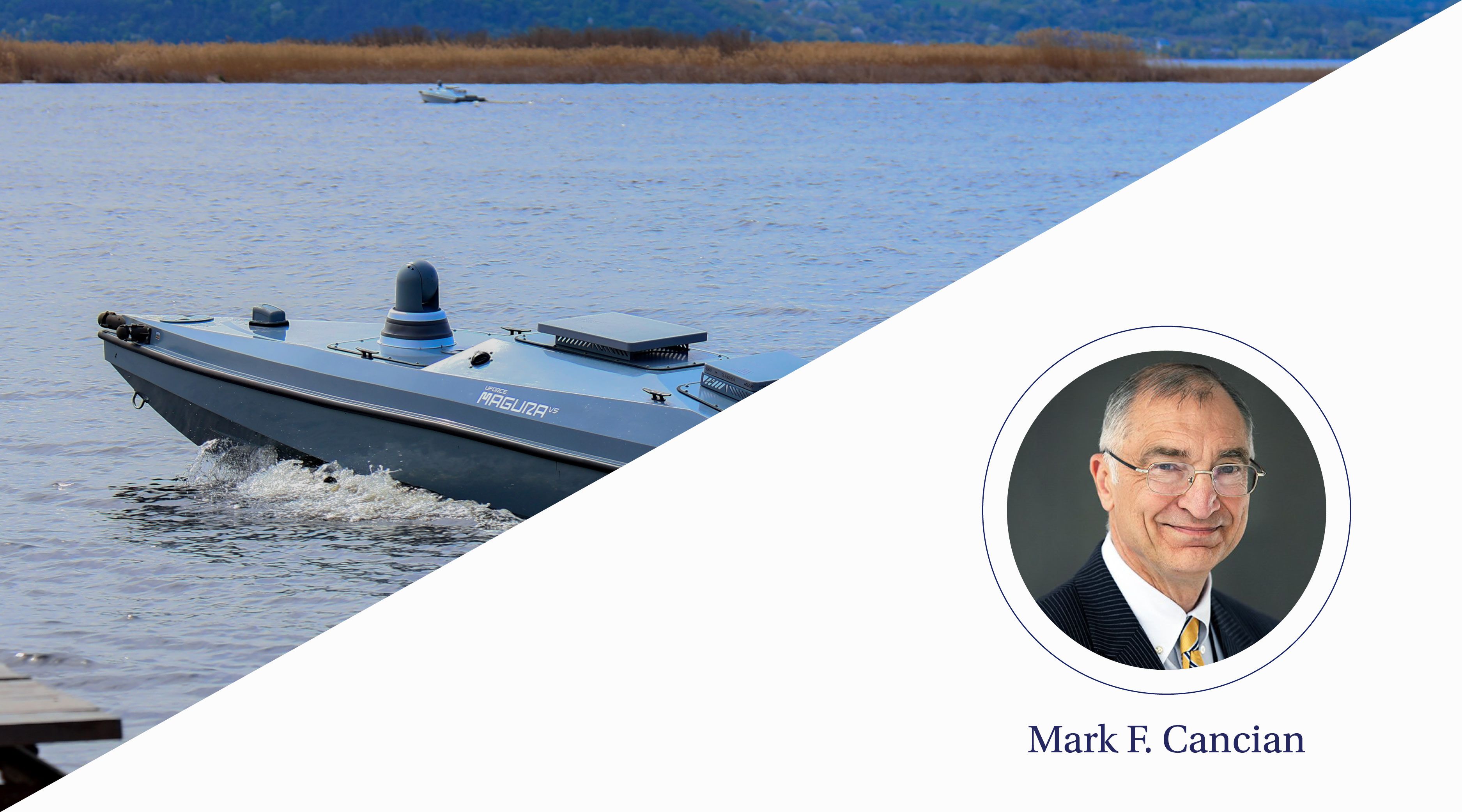 A boat-like vehicle courses through the water.